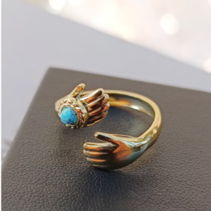 Golden Lagoon Hands Ring