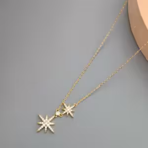 Gold Starburst Pendant Necklace
