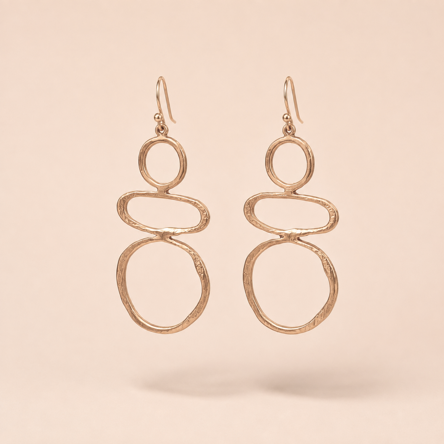 Golden Triple Circle Drop Earrings - Image 4