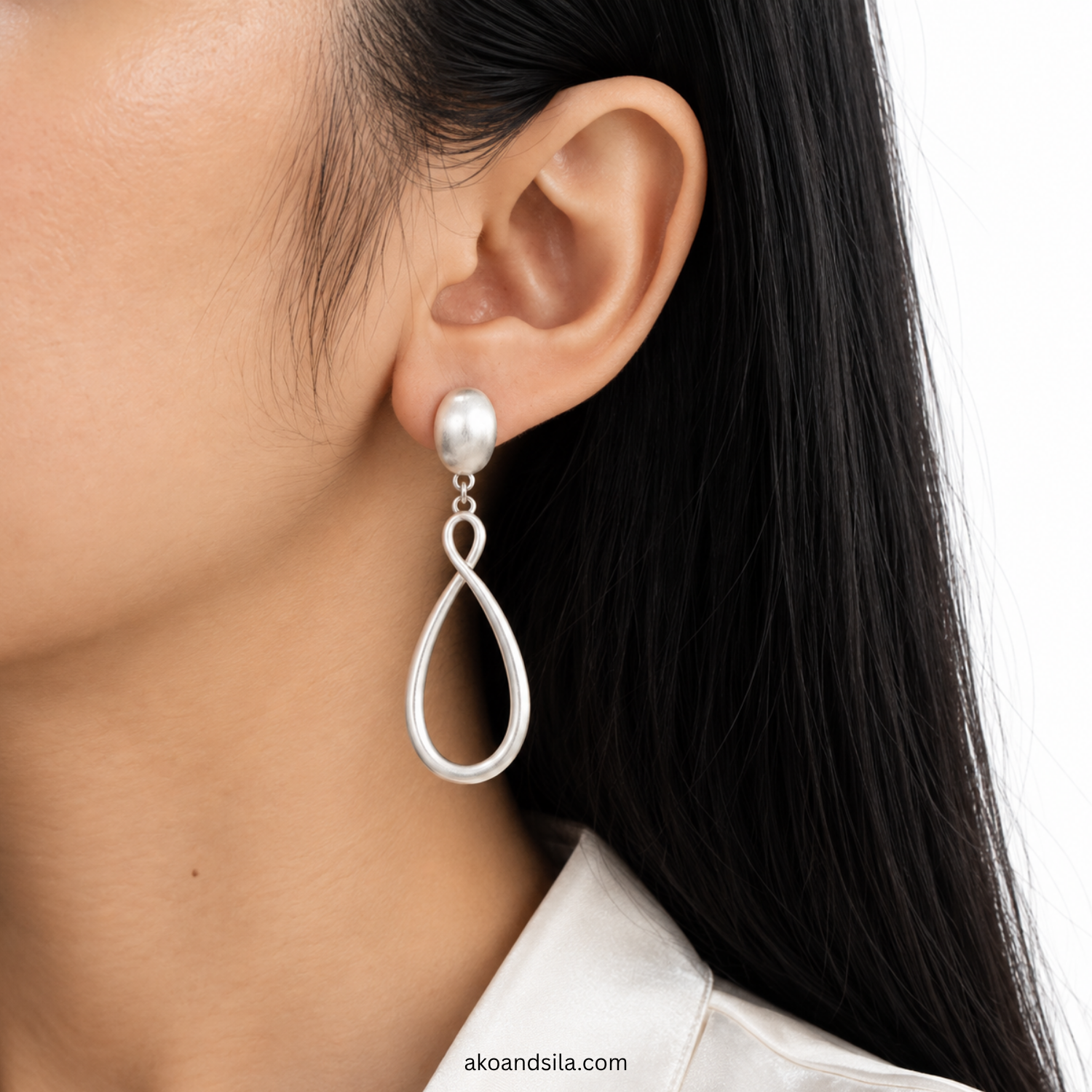 Silver Teardrop Outline Earrings - Image 4