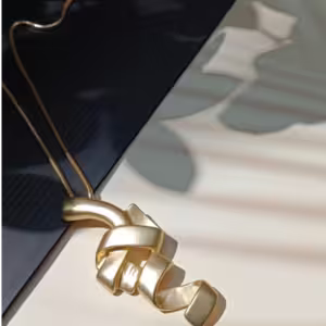 Gold Ribbon Pendant Necklace